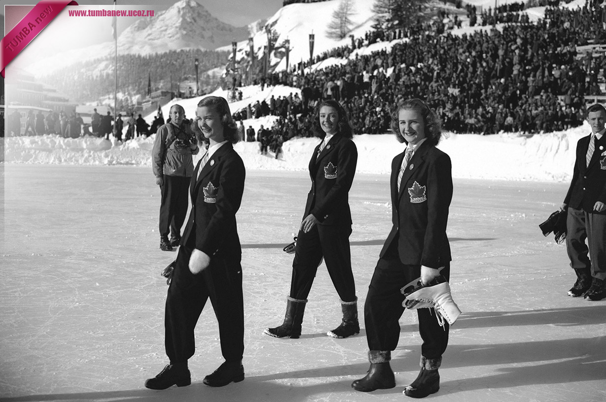 Швейцария. Санкт-Мориц, Граубюнден. 30 января 1948 года. Барбара Энн Скотт, Марион Рут Тейк и Сьюзан Морроу (слева направо) из Канады во время парада делегаций на церемонии открытия V Олимпийских зимних игр. (AP Photo)